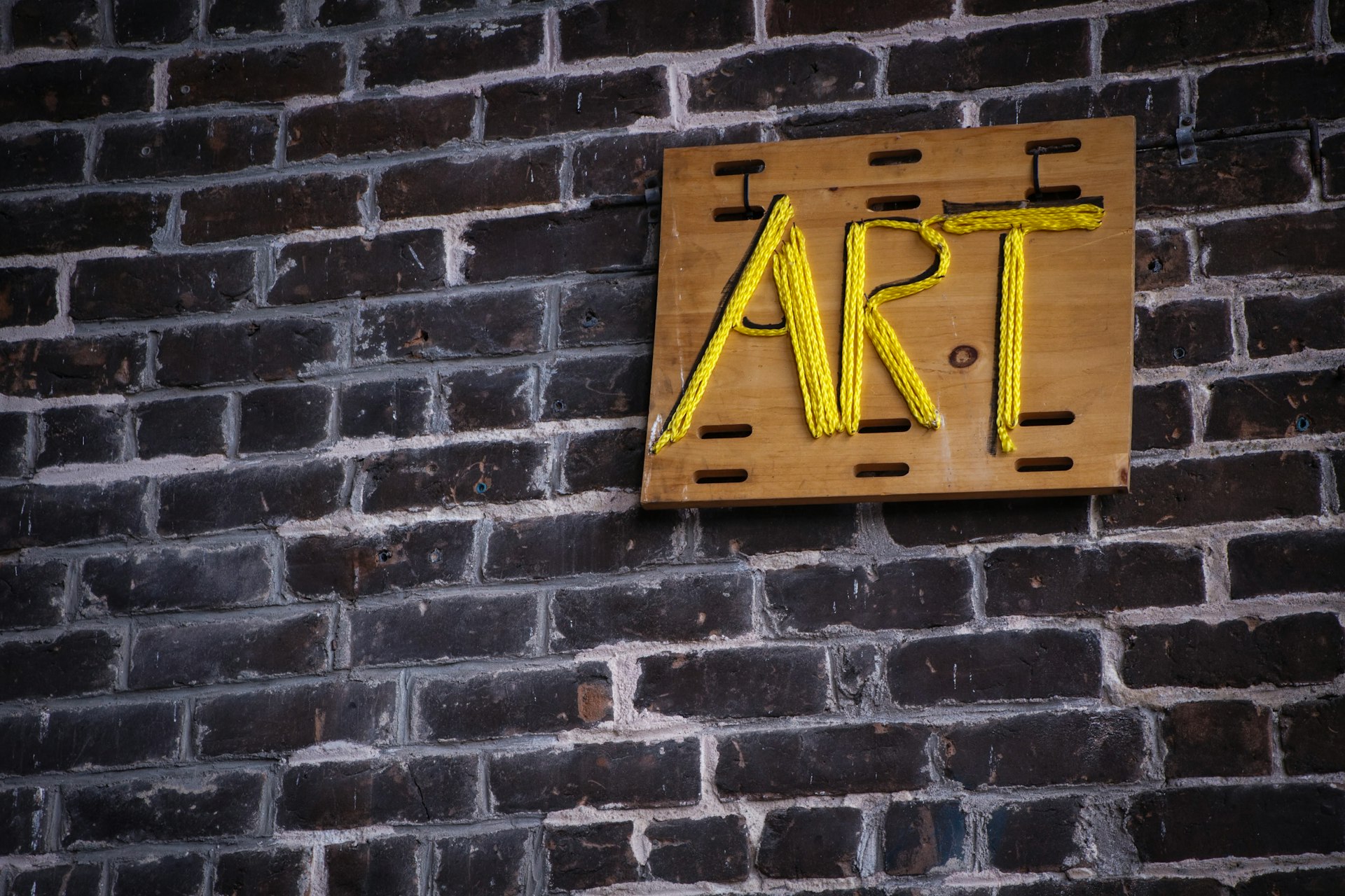 brown and yellow signage